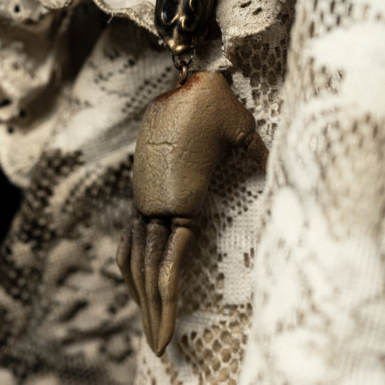 Angie doll replica, close up shot of hands.